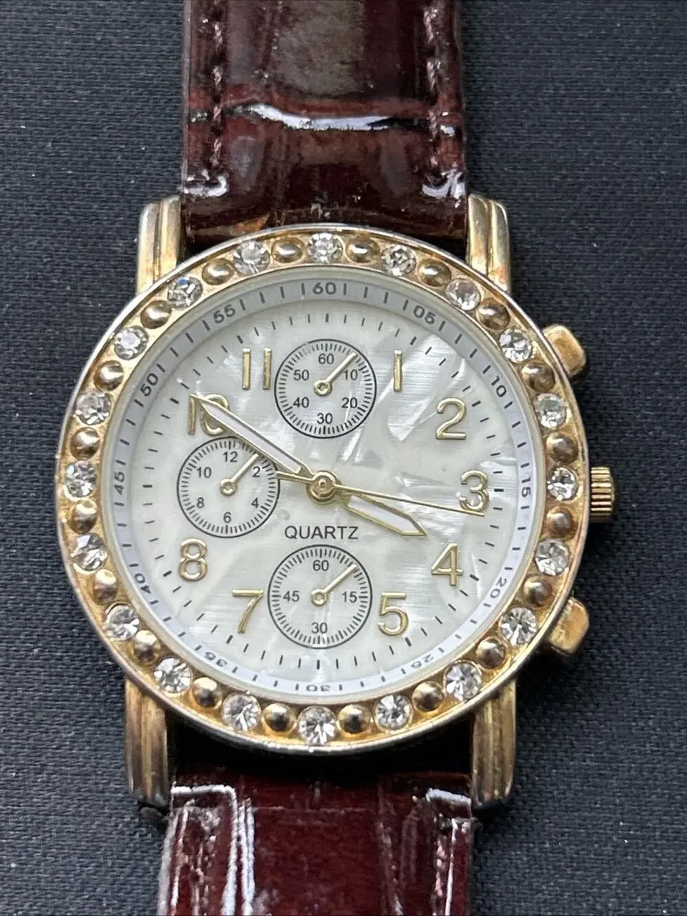 Gold Tone Pearlized Dial Women’s Quartz Watch